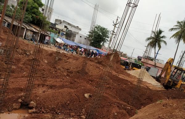 Earthworks and pole setting in progress on a civil site