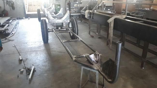 Fabricated steel trolley frames part-way through assembly